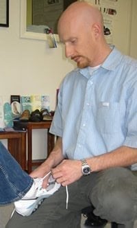 Aaron Anderson providing custom orthotics