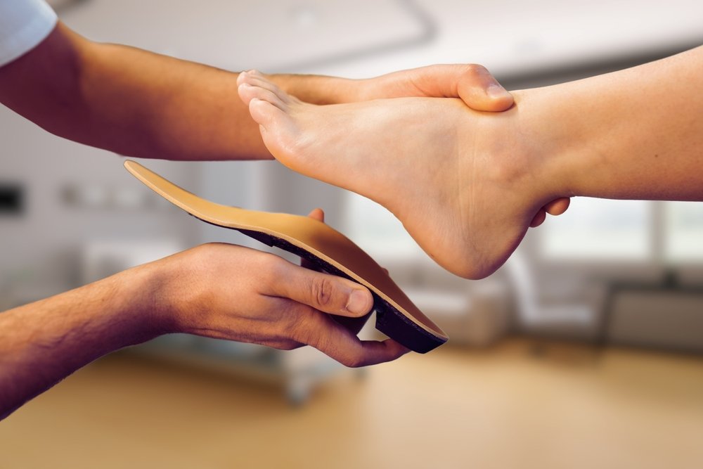 Aaron Anderson providing custom orthotics